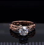 Front face view of a 2 CT round brilliant cut lab diamond ring set in rose gold