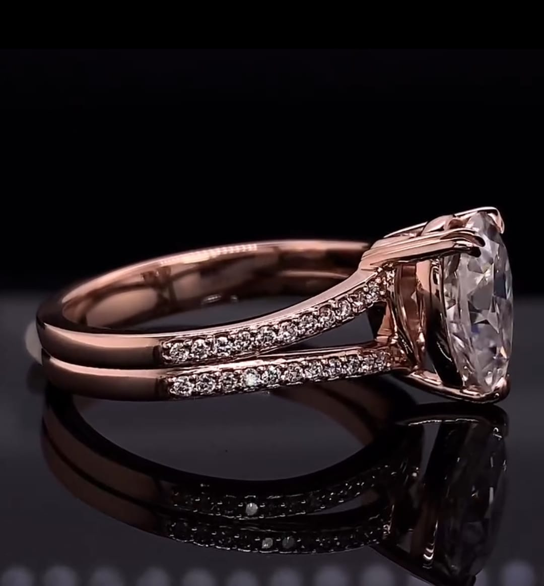 Side view showing the split shank structure and side profile of a 2 CT pear lab diamond ring