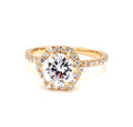 Top view of 2 CT round cut lab grown diamond engagement ring featuring a hexagon halo in yellow gold.