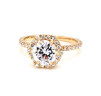 Top view of 2 CT round cut lab grown diamond engagement ring featuring a hexagon halo in yellow gold.