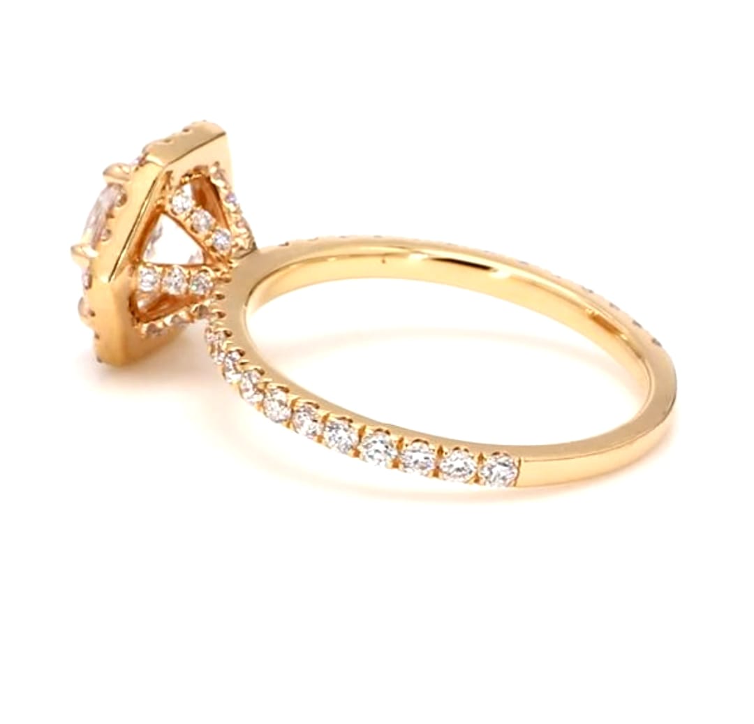 Side profile view showing the pave diamond band and under-gallery detail of gold engagement ring.