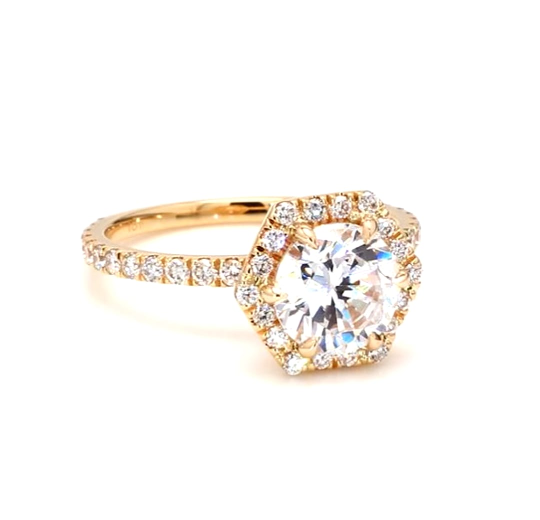 High-shine front angle of 2 CT round lab diamond ring in a yellow gold setting.