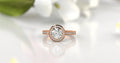 Top view of 2 CT round lab grown diamond halo ring in 18k rose gold