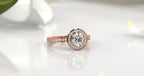 Angled top view showing 2 carat round lab diamond with pave band