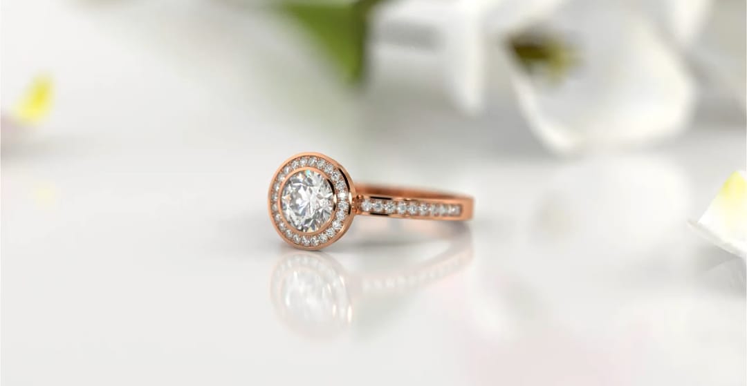 Perspective view of rose gold 2 CT round brilliant halo engagement ring