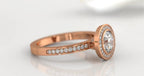 Side angle displaying the pave diamond band and raised halo setting