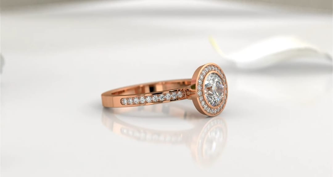 Side view highlighting the brilliant round center diamond and rose gold band