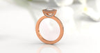 Profile view showcasing the crescent under-halo setting with accent diamonds