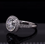 Side perspective of an art-deco inspired engagement ring featuring a 3 carat round lab created diamond.