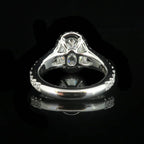 Under-gallery and back setting view of a 2 carat oval lab grown diamond engagement ring.