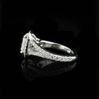Angled side profile of a 2 CT oval halo diamond engagement ring showing band details on a black background.