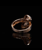 Back profile view of a rose gold Toi et Moi ring showing the detailed under-gallery of the pear and marquise lab grown diamonds.