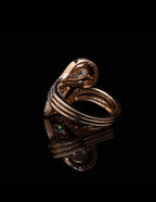 Low angle side view of a dual-stone lab grown diamond ring, emphasizing the elegant curvature of the multi-row bypass band.