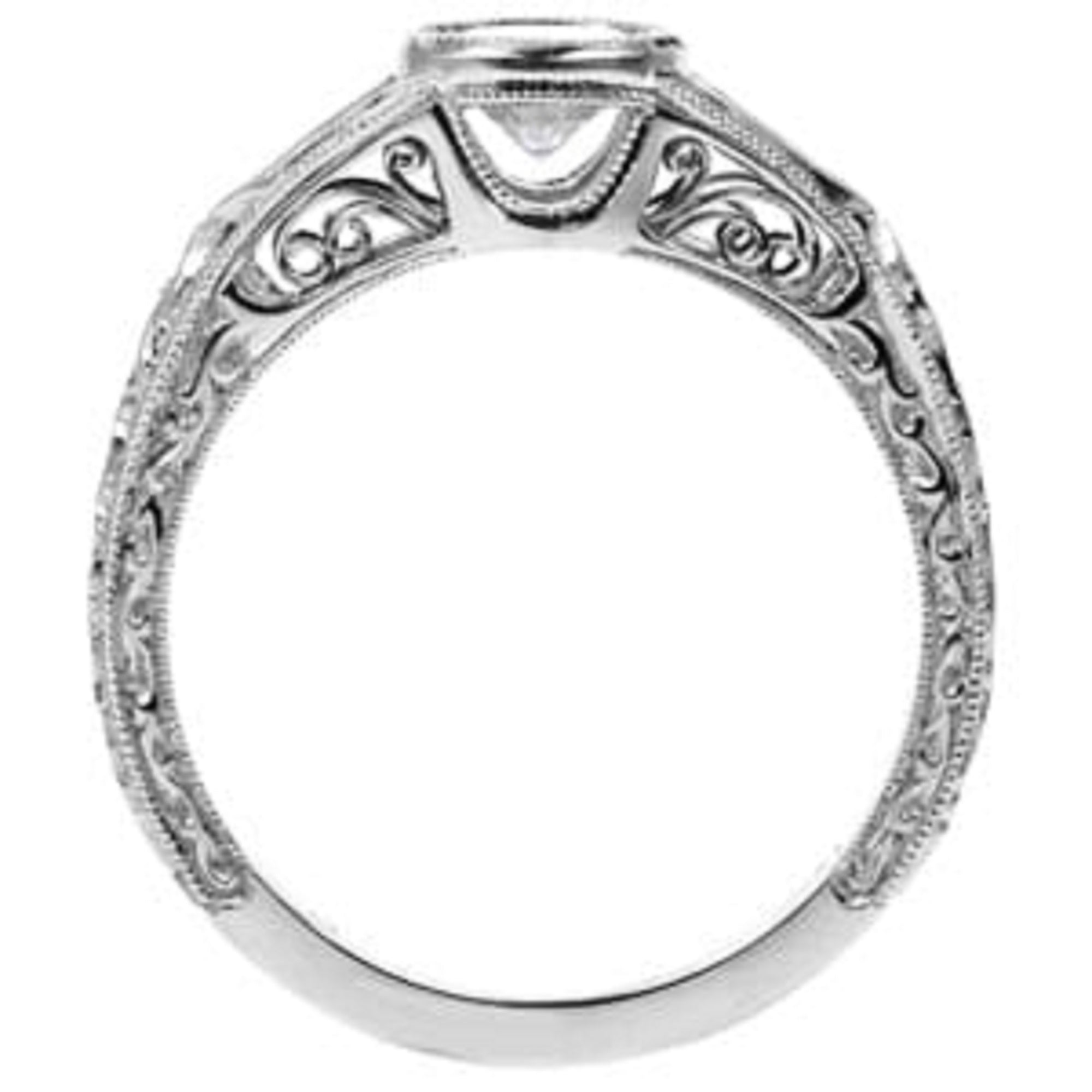 Side profile view of a vintage engagement ring gallery and band, highlighting the detailed under-bezel filigree and engraved band details.