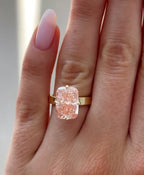 Full hand view displaying a breathtaking 3 carat fancy pink radiant cut lab diamond minimalist engagement ring.