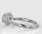 Side profile of a round diamond engagement ring featuring a thick micro-pavé halo and a multi-row diamond encrusted band.