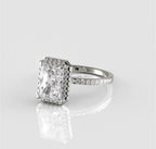 Three-quarter top view of the 3 carat radiant cut lab grown diamond showing its bright crushed-ice sparkle, halo, and thin pavé band.