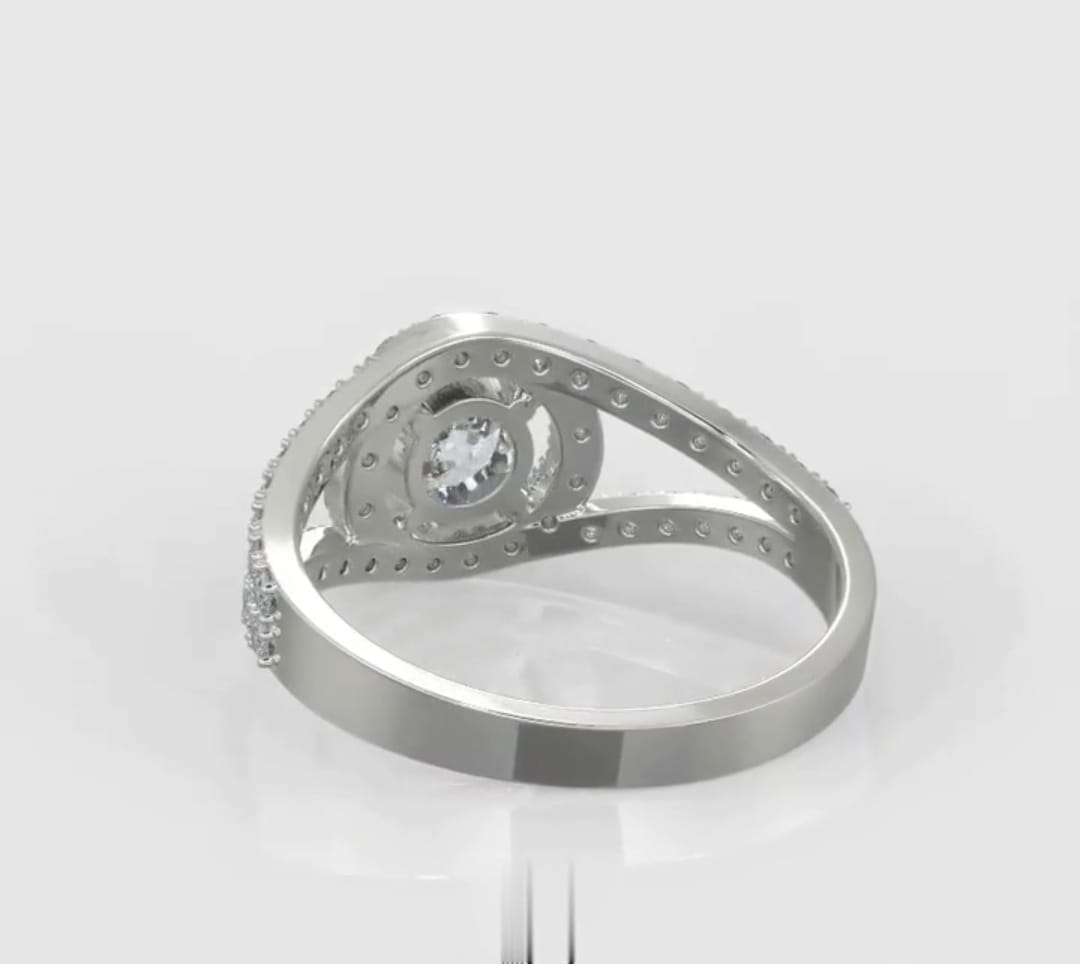 Angled top-down view of a 2 CT round cut lab grown diamond engagement ring featuring a pave split shank band.