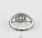 Underneath profile view of a 2 carat round lab grown diamond ring showcasing the intricate open gallery and pave diamond setting.