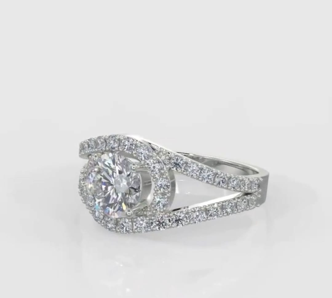 Side profile of a 2 CT round lab diamond engagement ring highlighting the sweeping bypass diamond bands and floating center stone.