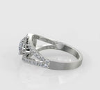 Side angle view of a silver or white gold lab grown diamond engagement ring showing the structural arches of the pave split shank.