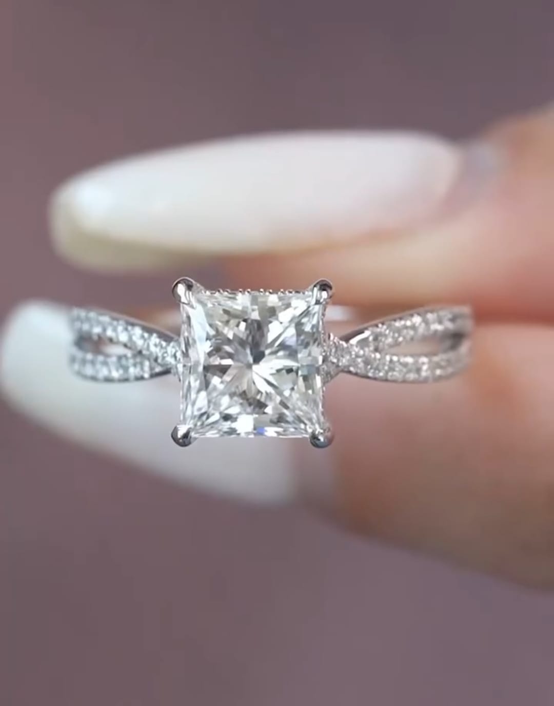 Top-down view of a brilliant 2 CT princess cut diamond engagement ring featuring a sparkling, intertwined twisted split shank.