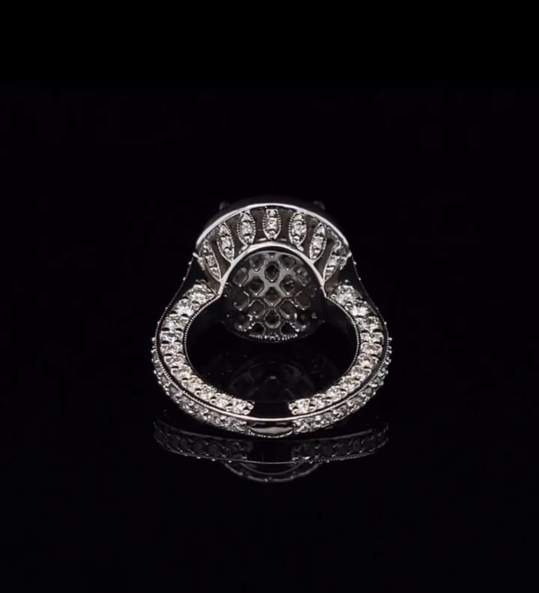Detailed view of the under-gallery and diamond-set milgrain band of a 3 CT lab grown diamond ring.