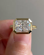 Front view highlighting the brilliant sparkle of a horizontally set 3 CT radiant cut lab grown diamond.