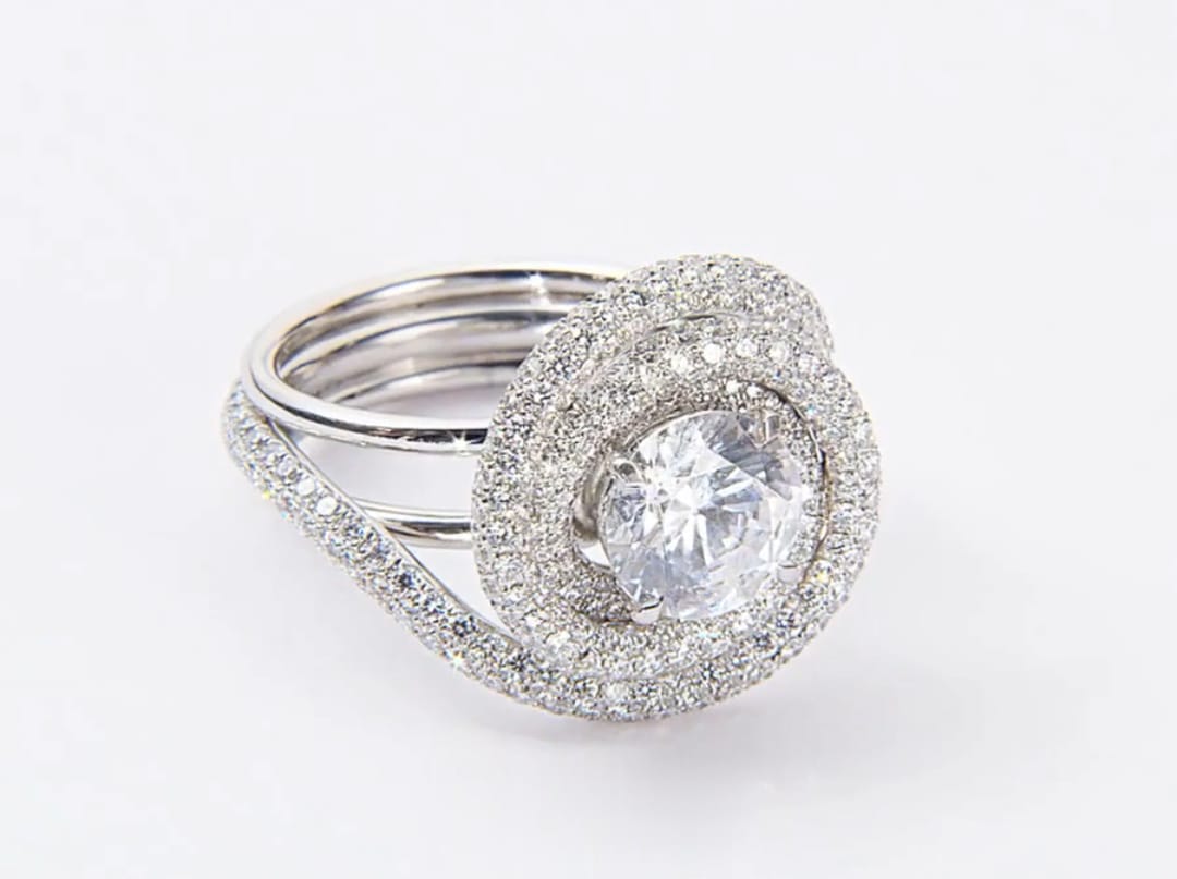 Top angle view of 2 CT round lab-grown diamond ring with spiral double halo setting