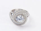 Overhead close-up of 2.00 carat round brilliant lab diamond in double spiral halo