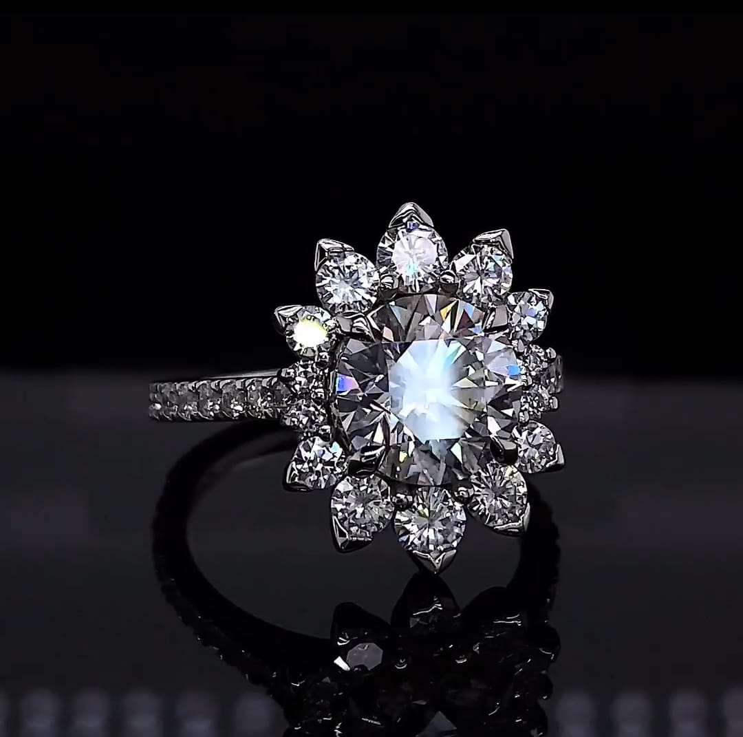 Front view of 3 carat round cut lab grown diamond engagement ring with floral sunburst halo.