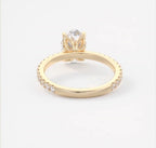 View beneath the setting showing 4-prong petal basket details in 14k yellow gold.