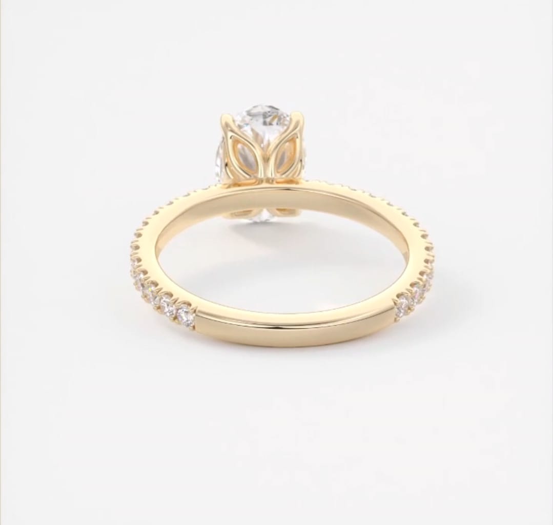 View beneath the setting showing 4-prong petal basket details in 14k yellow gold.
