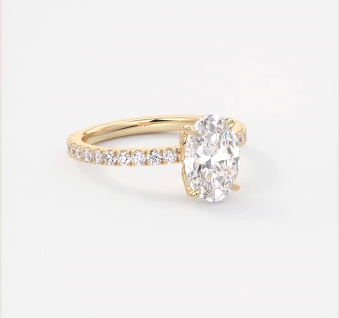 High-definition rendering of 2 carat oval lab grown diamond ring with accent band.