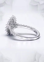 Side perspective showing the floral halo setting and pavé diamond band on a 2 CT pear lab diamond ring.