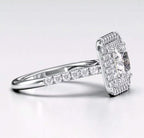 Angled view showcasing white gold pave band and double halo framing a princess cut diamond