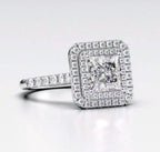 Perspective view highlighting the square double halo and sparkling princess cut diamond