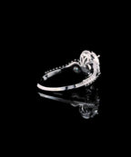 Under-gallery detail and polished white gold band of 3 carat pear lab diamond engagement ring