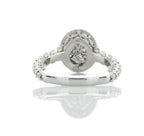 View from under the basket showcasing intricate scrollwork and smooth band of an oval lab created diamond ring.