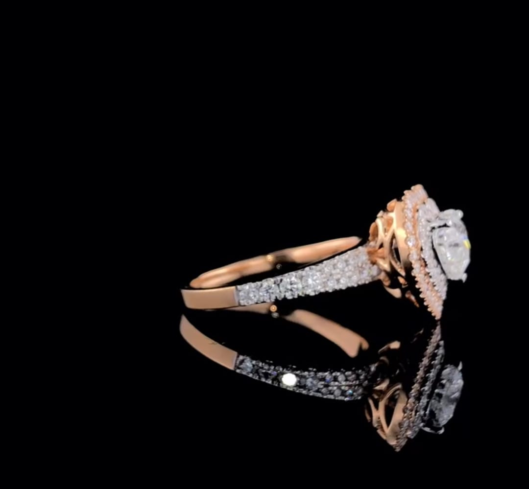 Side angle highlighting the multi-row pave diamond band and raised double halo setting of a 2ct heart lab diamond ring.