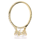 Clear view of intricate ornate gallery and pavé band on yellow gold diamond ring