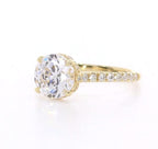 Angled side view showcasing center diamond brilliance and yellow gold pavé band