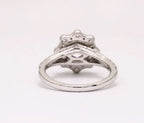 Direct under-side view of scalloped halo and comfort-fit band on lab diamond ring