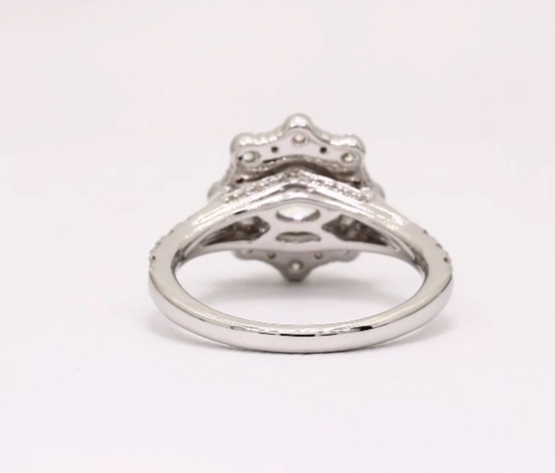 Direct under-side view of scalloped halo and comfort-fit band on lab diamond ring