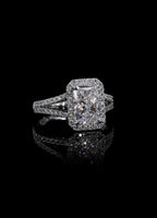 Front view of 3 CT radiant cut lab grown diamond ring with halo and split shank band