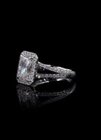 Side profile view showing the dual pavé split shank design in white gold