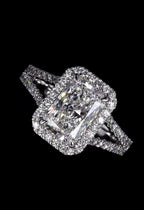 Close-up top view of 3 CT radiant cut lab diamond with glowing halo on black reflection