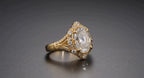 Three-quarter angle of 3 CT oval lab diamond vintage ring in yellow gold with split shank