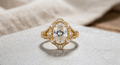 Direct front view of 3 carat oval lab diamond with scalloped milgrain halo frame