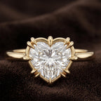 Side profile view showcasing the intricate high-set under gallery basket of a heart cut diamond ring.